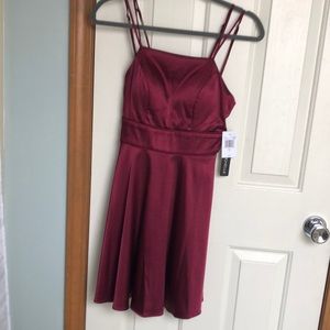 Knee-length semiformal maroon dress size 3 from My Michellle, shiny, sil…